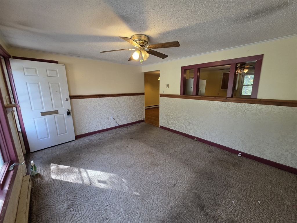 71 Wendell Street Athol, MA 01331 - Photo 4 of 12 a view of an empty room with window