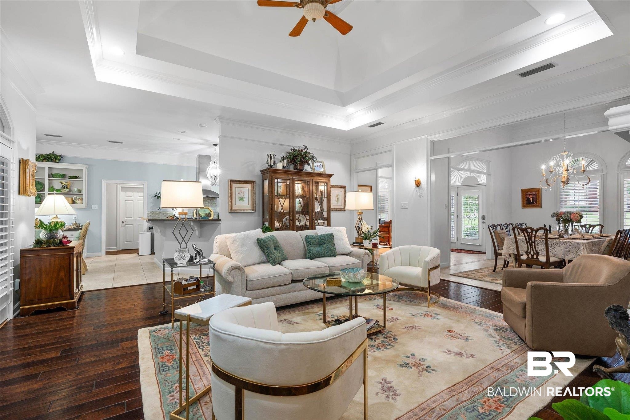 136 Old Mill Road Fairhope, AL 36532 - Photo 10 of 36 Spacious living area featuring wood-finish flooring, a tray ceiling with a ceiling fan, and recessed lighting