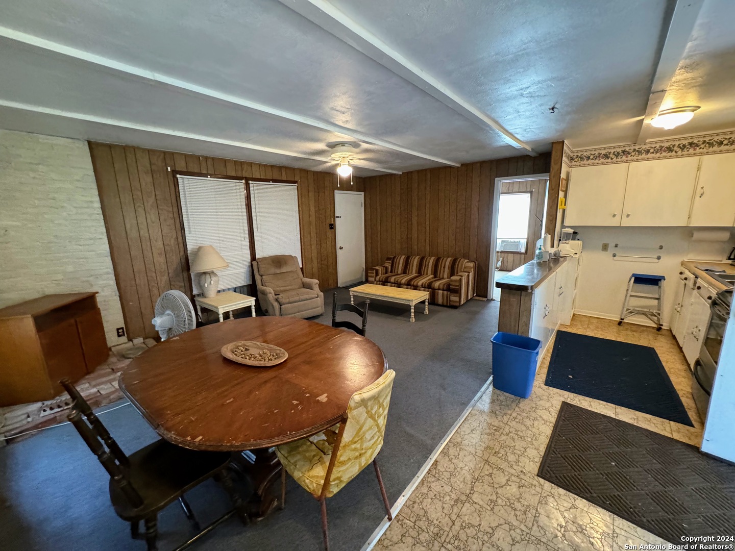 201 Cypress Bluff Road Pipe Creek, TX 78063 - Photo 11 of 16 a view of a dining room with furniture