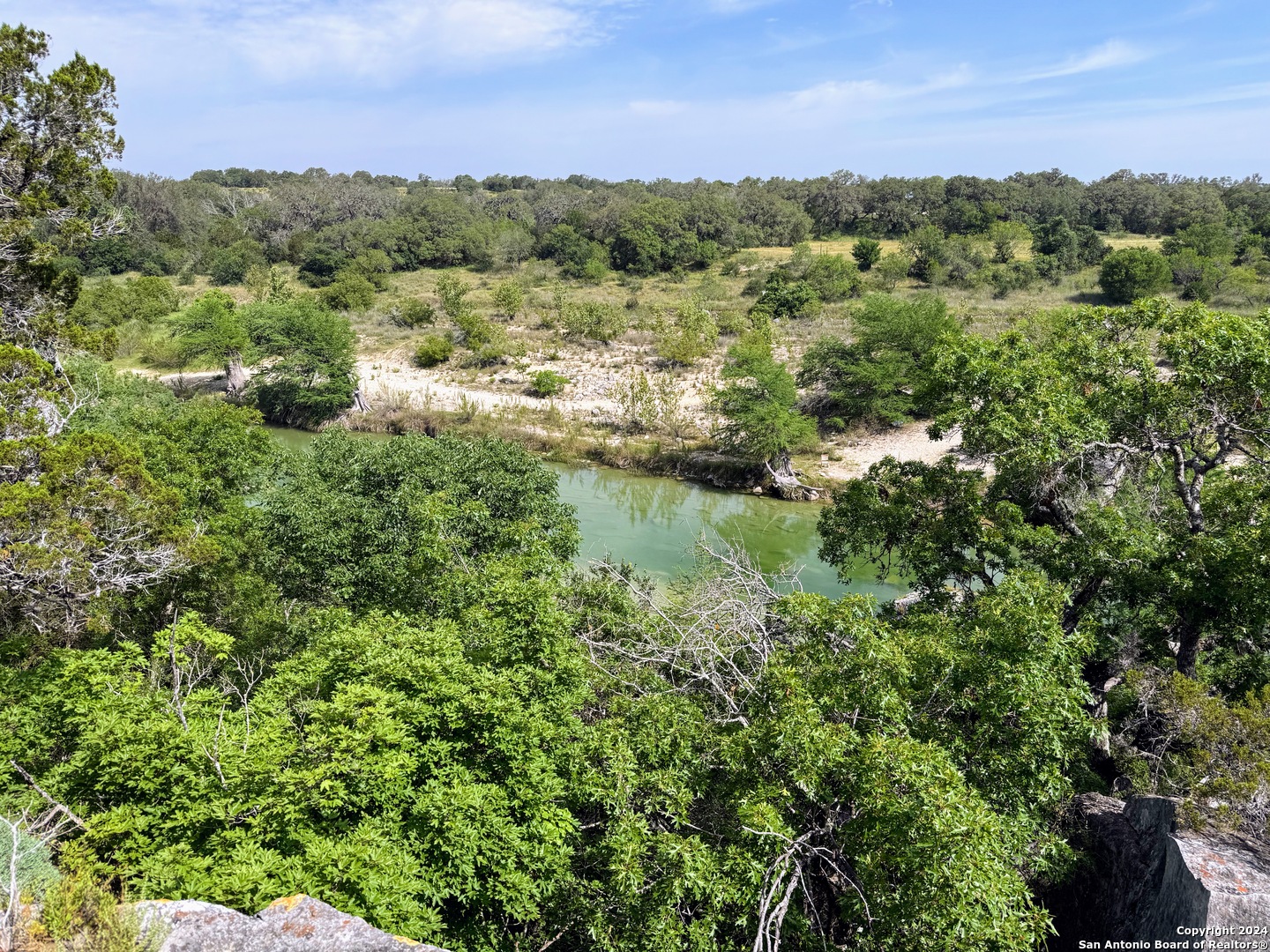201 Cypress Bluff Road Pipe Creek, TX 78063 - Photo 3 of 16 a view of a city with lush green forest