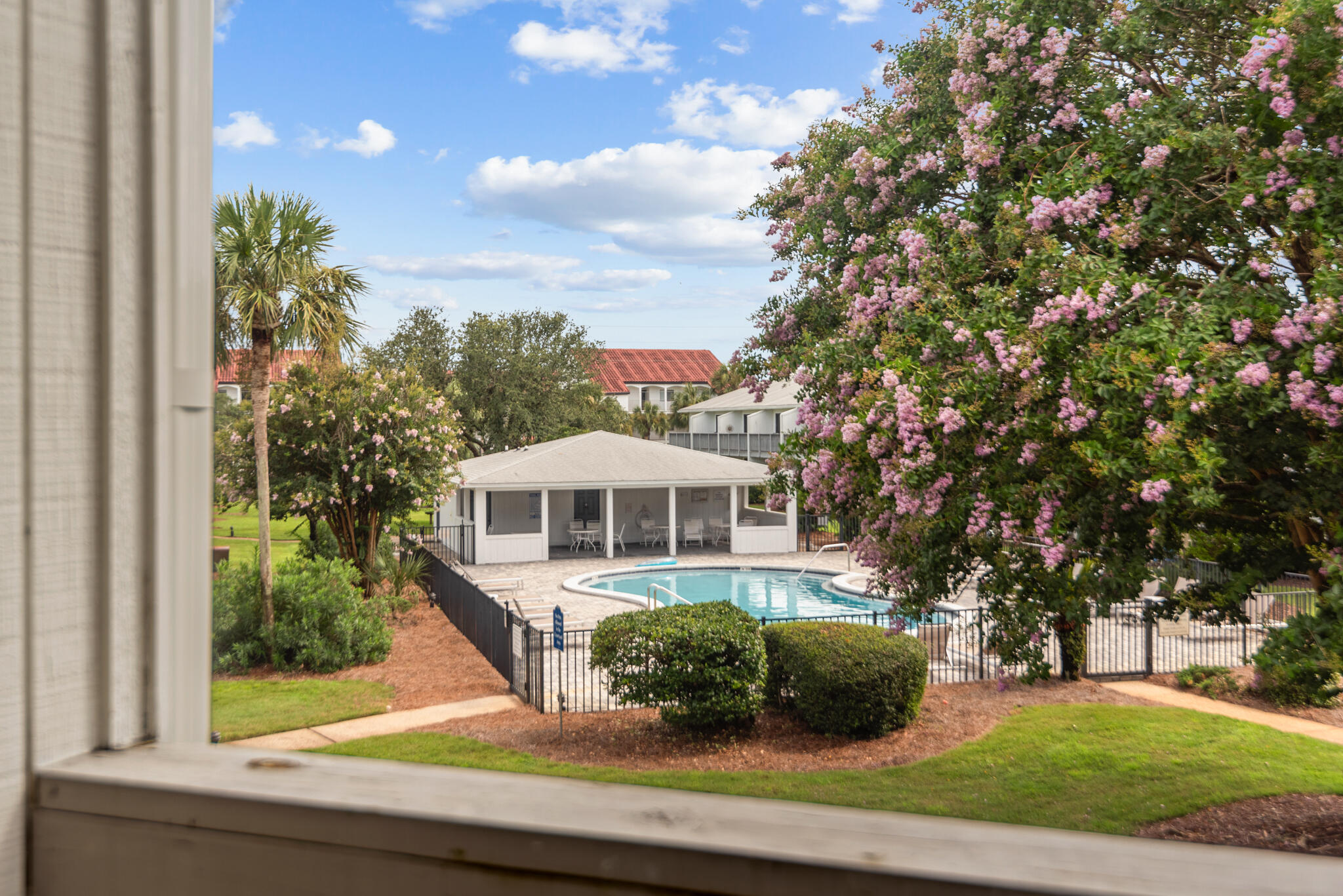 3605 East County Highway 30A, Unit 223 Santa Rosa Beach, FL 32459 - Photo 17 of 30 a front view of a house with a yard