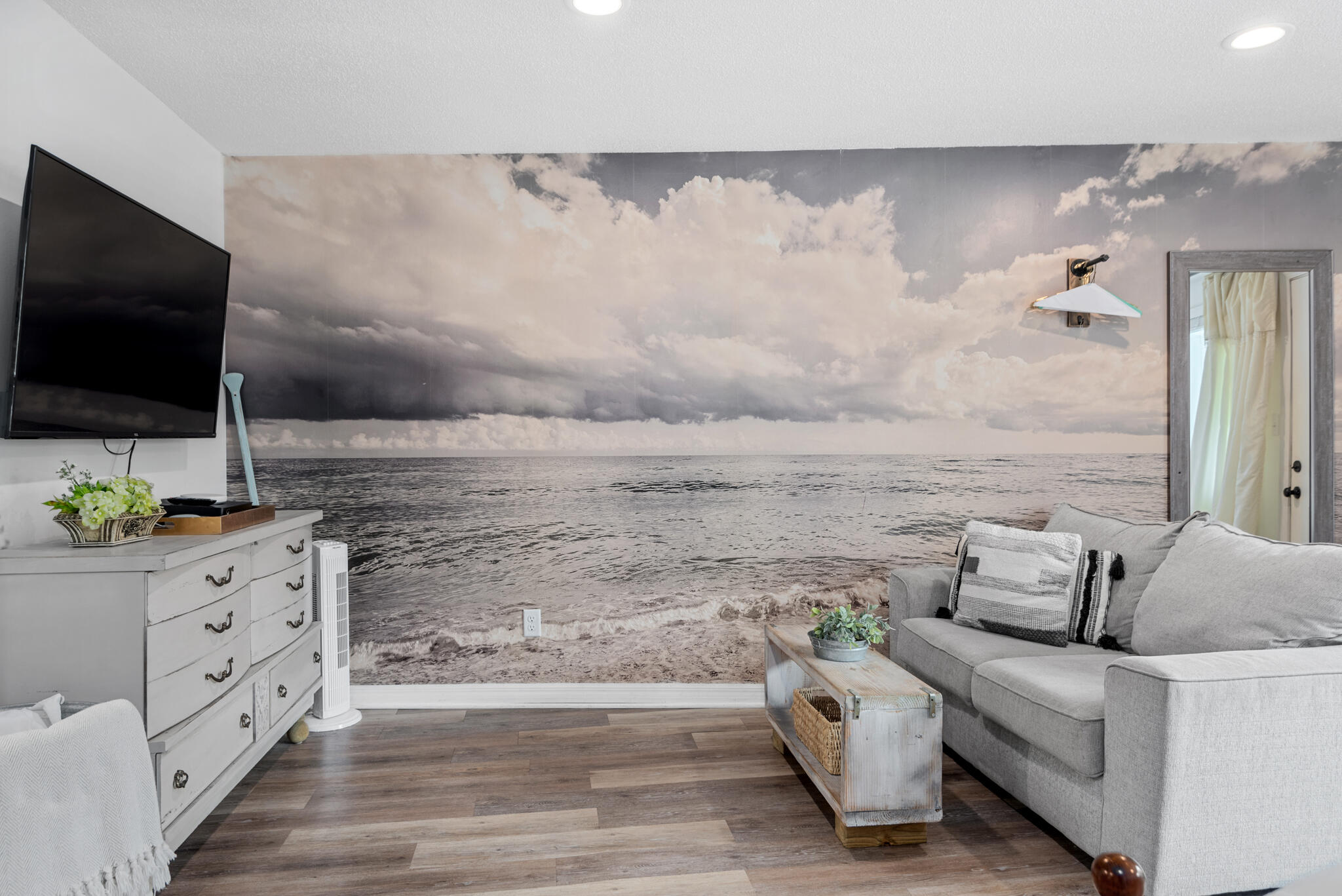 3605 East County Highway 30A, Unit 223 Santa Rosa Beach, FL 32459 - Photo 10 of 30 a living room with furniture and a flat screen tv