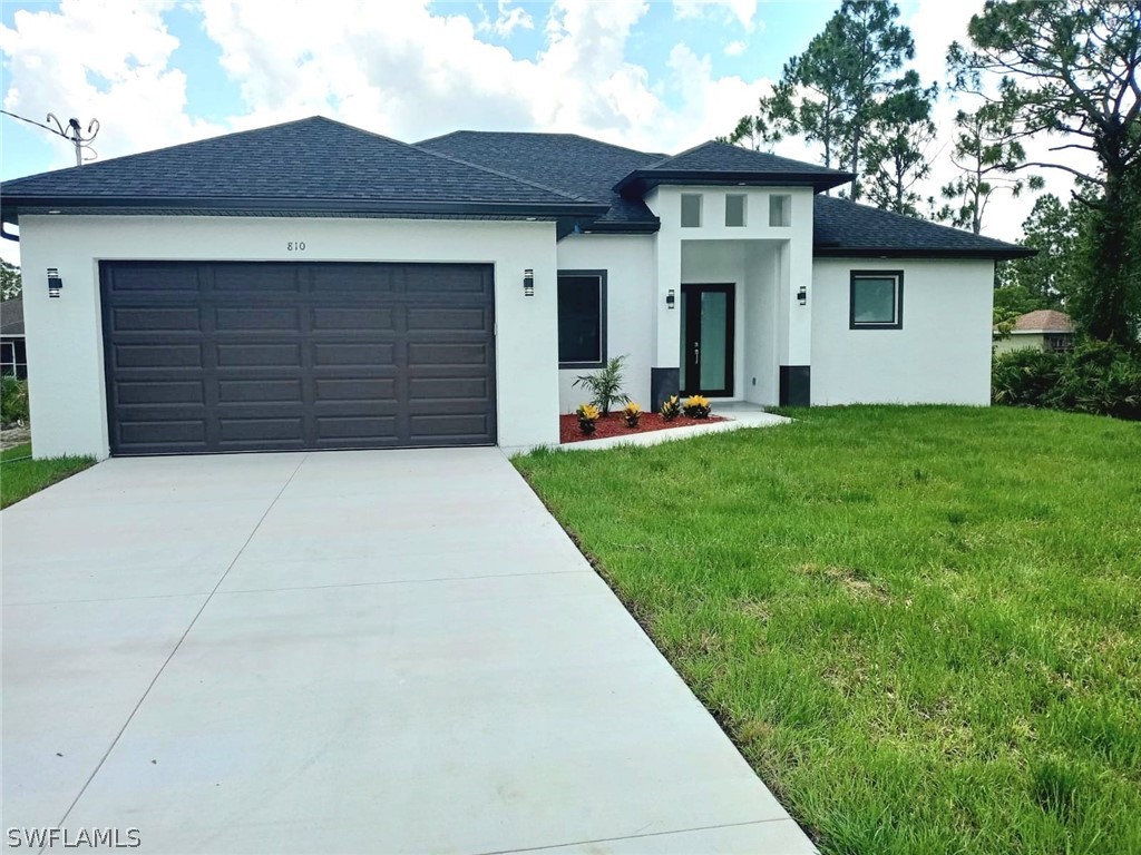 a front view of house with yard