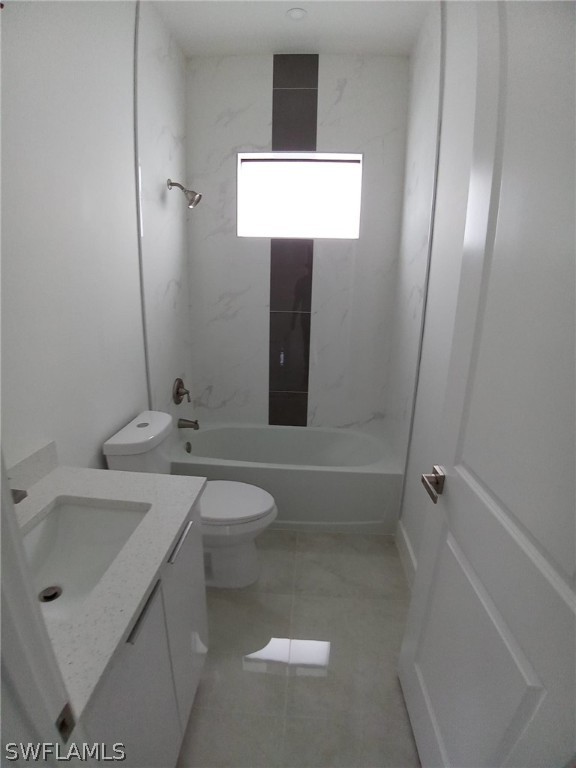 810 Homestead Road South Lehigh Acres, FL 33974 - Photo 13 of 18 a bathroom with a toilet sink and mirror