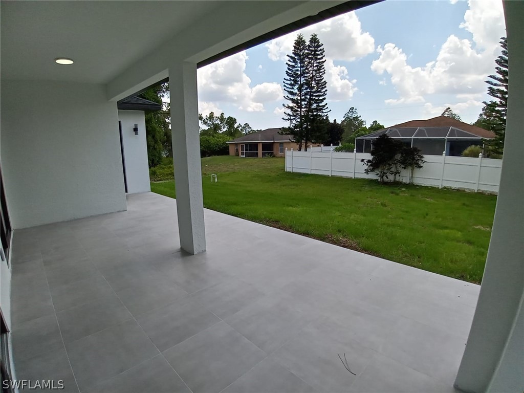 810 Homestead Road South Lehigh Acres, FL 33974 - Photo 15 of 18 a view of a garden