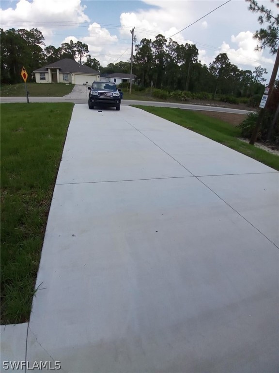 810 Homestead Road South Lehigh Acres, FL 33974 - Photo 3 of 18 a view of outdoor space yard and green space