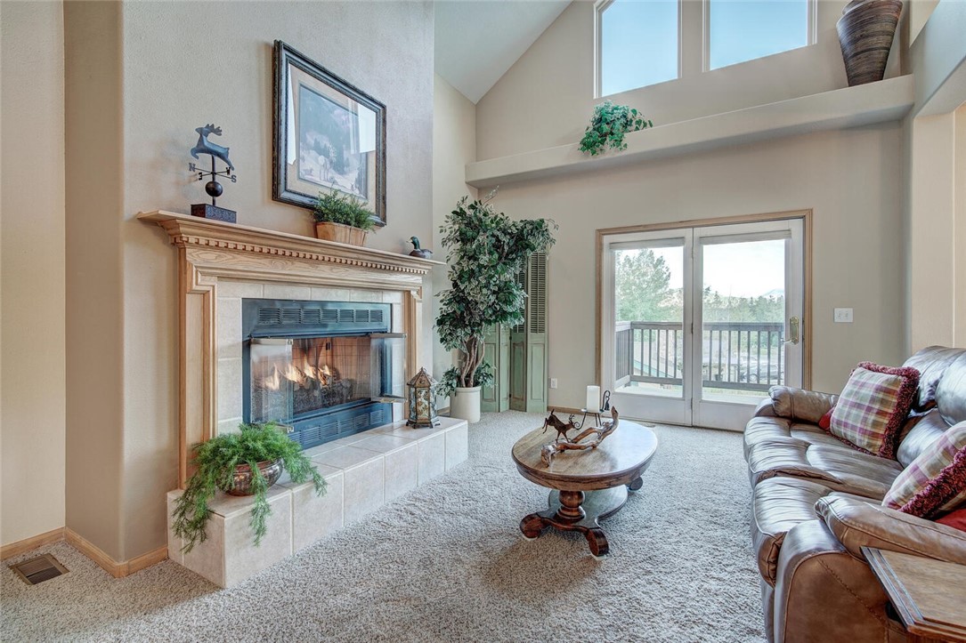 591 Ryan Gulch Road Silverthorne, CO 80498 - Photo 6 of 34 Cuddle up in front of the fireplace and unwind after a day on the mountain.