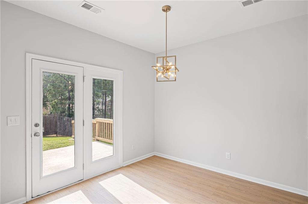3650 River Rock Road Lithonia, GA 30038 - Photo 15 of 42 a view of an empty room with a window