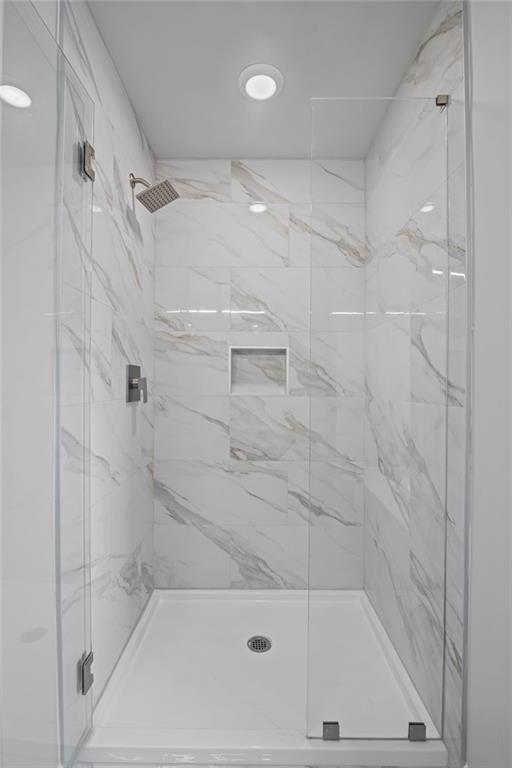 3650 River Rock Road Lithonia, GA 30038 - Photo 24 of 42 a bathroom with a shower and bathtub