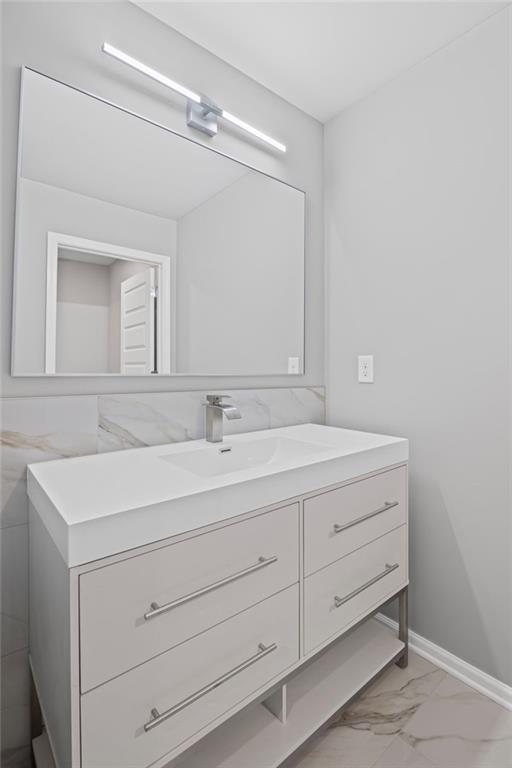 3650 River Rock Road Lithonia, GA 30038 - Photo 34 of 42 a bathroom with a sink and a mirror