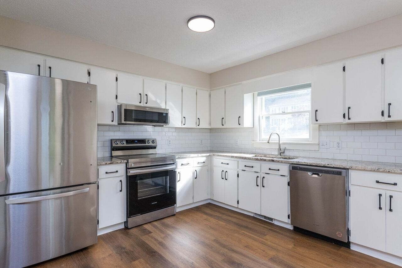 7305 Wilderness Road Raleigh, NC 27613 - Photo 8 of 27 Photo 8