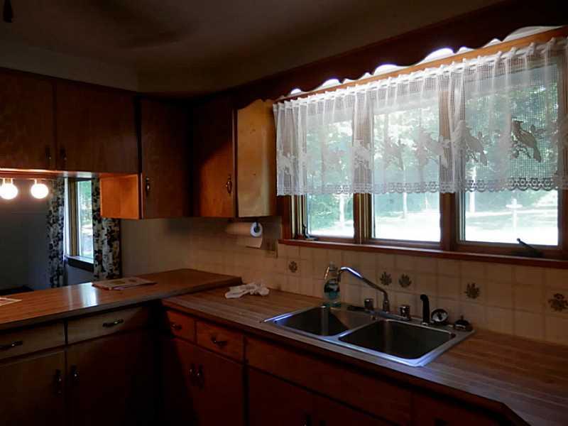 782 Arona Road New Stanton, PA 15672 - Photo 12 of 19 Kitchen. The kitchen overlooks the mature gardens.