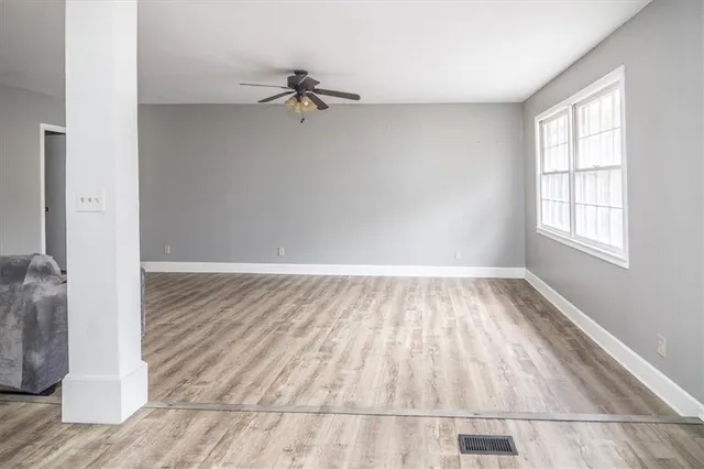 an empty room with windows