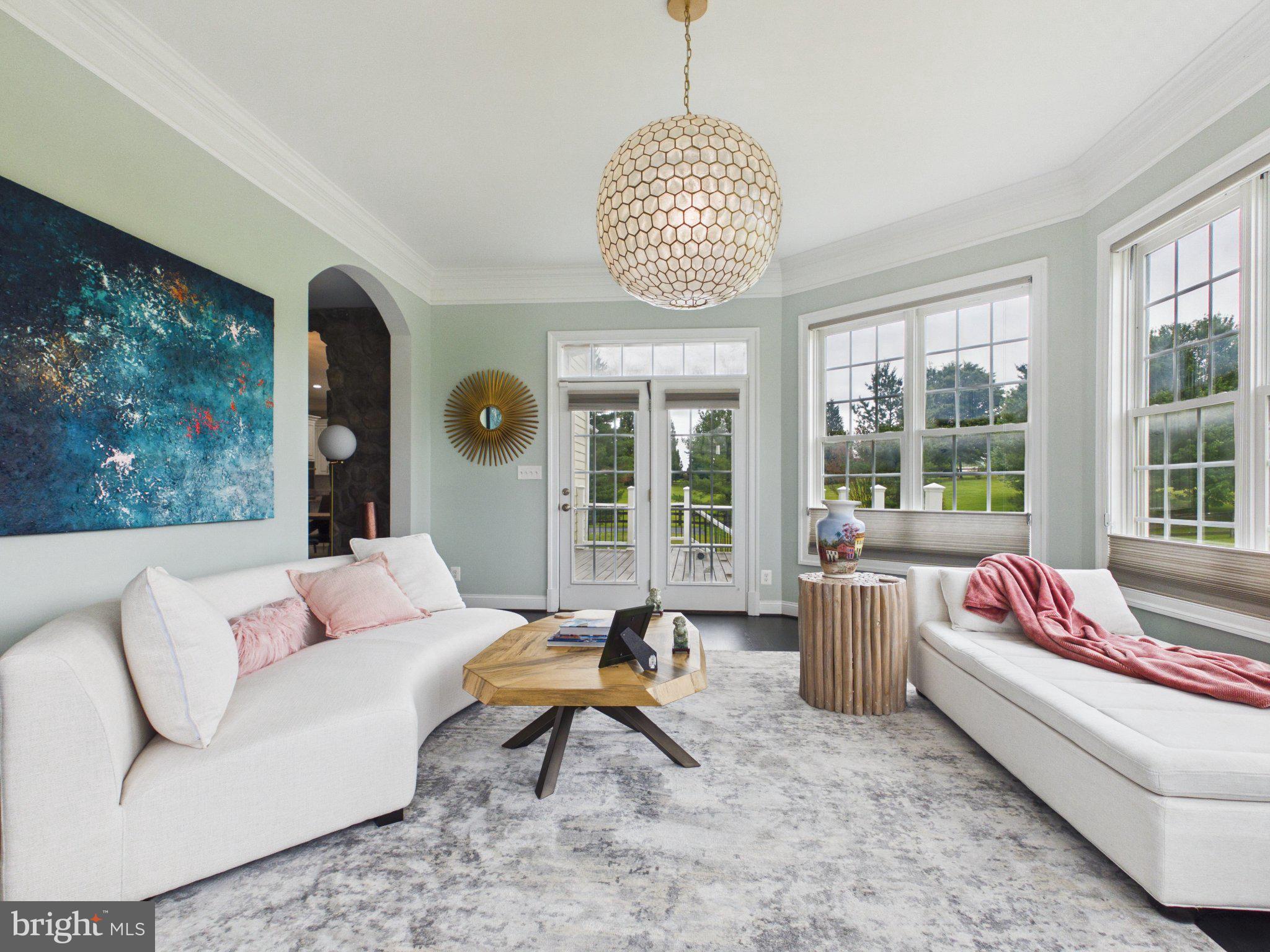38565 Piggott Bottom Road Hamilton, VA 20158 - Photo 22 of 85 a living room with furniture chandelier and a large window