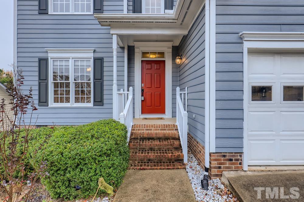5405 Staysail Court Raleigh, NC 27613 - Photo 3 of 28 a front view of a house with a yard