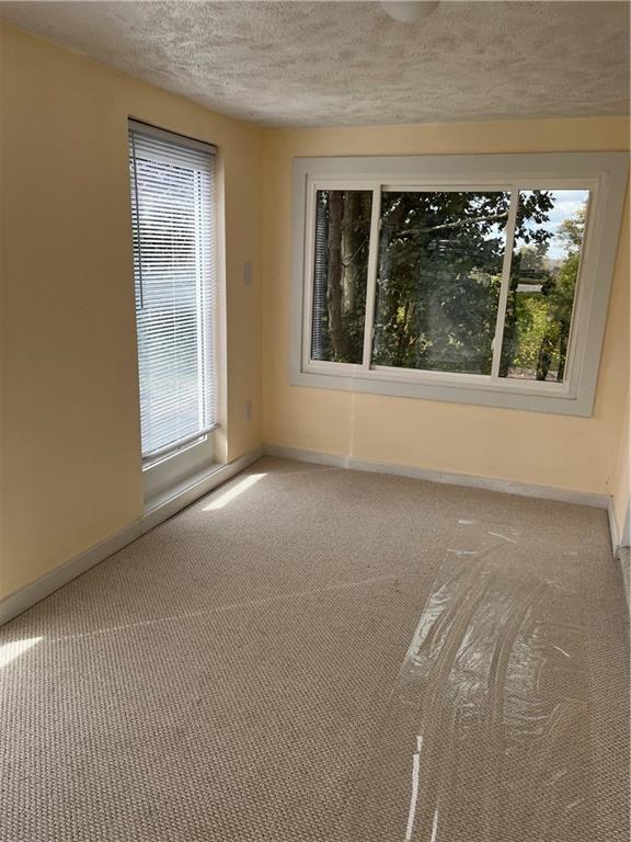 2517 Monroeville Boulevard Monroeville, PA 15146 - Photo 11 of 24 a view of a livingroom with an empty space and window