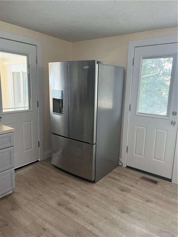 2517 Monroeville Boulevard Monroeville, PA 15146 - Photo 14 of 24 a view of a kitchen with wooden floor and window
