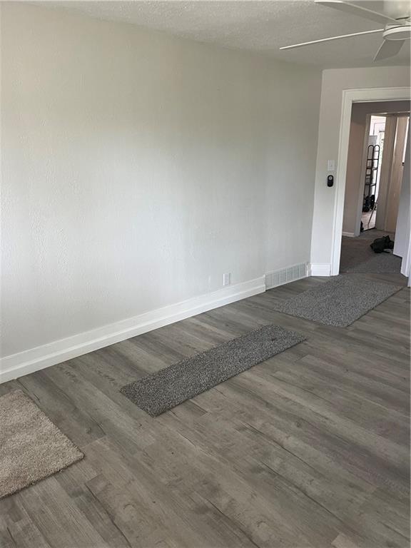 2517 Monroeville Boulevard Monroeville, PA 15146 - Photo 4 of 24 an empty room with wooden floor and windows