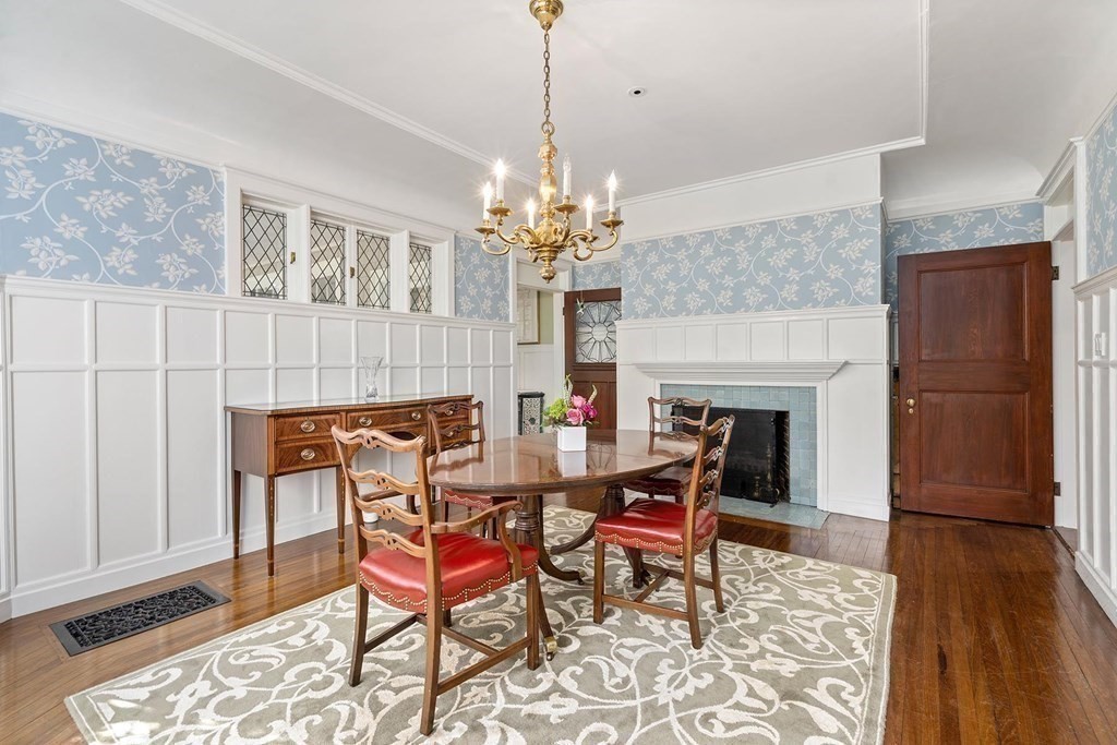 37 Circuit Road Brookline, MA 02467 - Photo 12 of 37 a dining room with furniture a chandelier and wooden floor