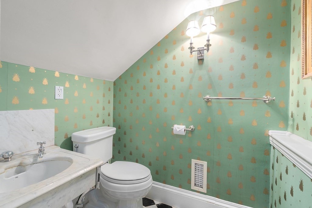 37 Circuit Road Brookline, MA 02467 - Photo 16 of 37 a bathroom with a sink a toilet and shower