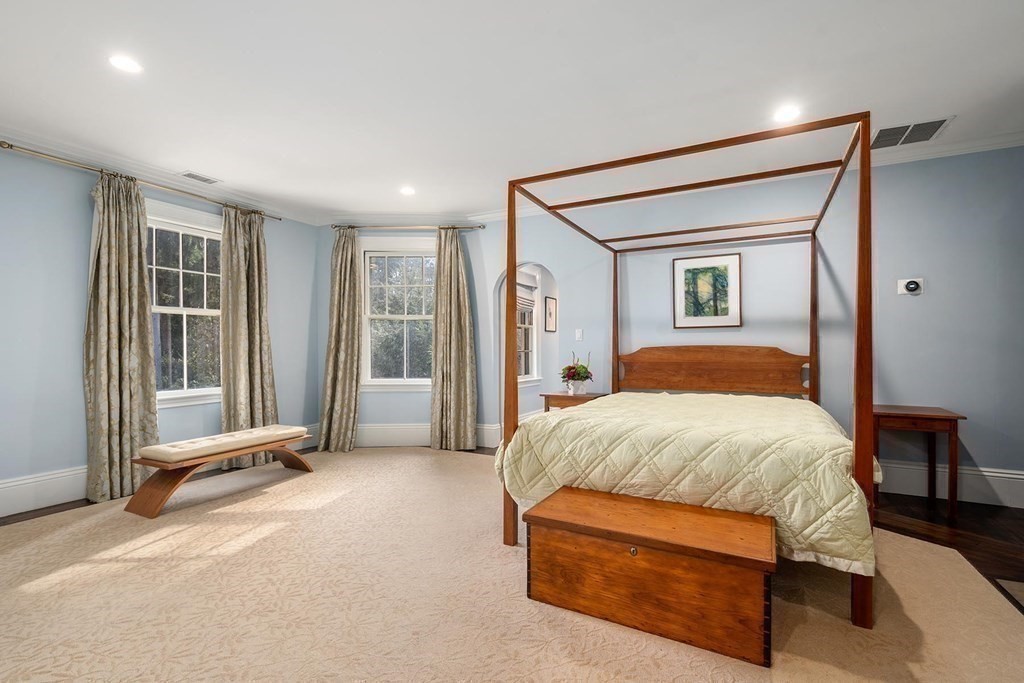 37 Circuit Road Brookline, MA 02467 - Photo 24 of 37 a bedroom with a large bed and a window