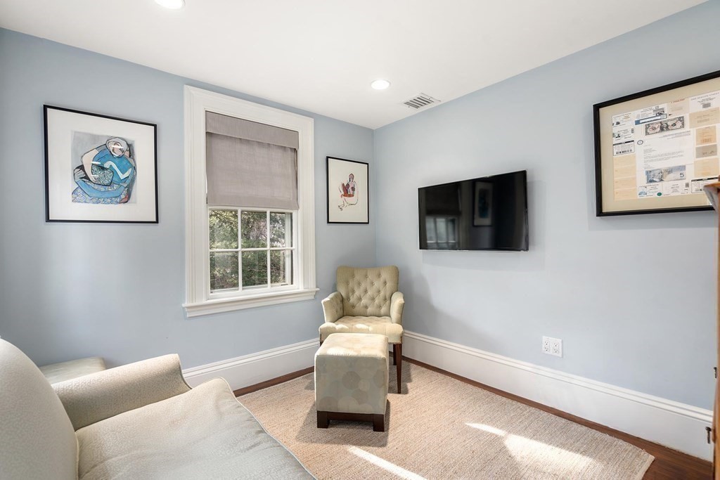 37 Circuit Road Brookline, MA 02467 - Photo 26 of 37 a living room with furniture and a flat screen tv