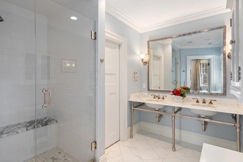 37 Circuit Road Brookline, MA 02467 - Photo 27 of 37 a bathroom with a sink and a mirror