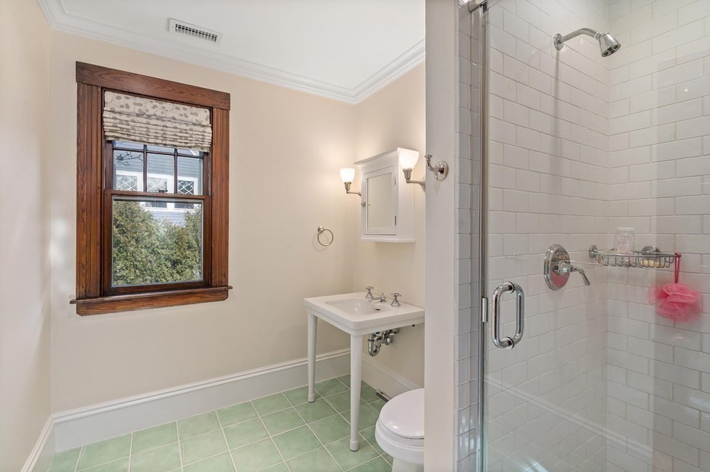 37 Circuit Road Brookline, MA 02467 - Photo 30 of 37 a bathroom with a toilet sink and shower