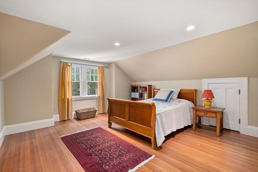 37 Circuit Road Brookline, MA 02467 - Photo 32 of 37 a bed room with a bed and a window