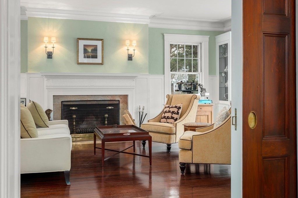 37 Circuit Road Brookline, MA 02467 - Photo 7 of 37 a living room with furniture and a fireplace