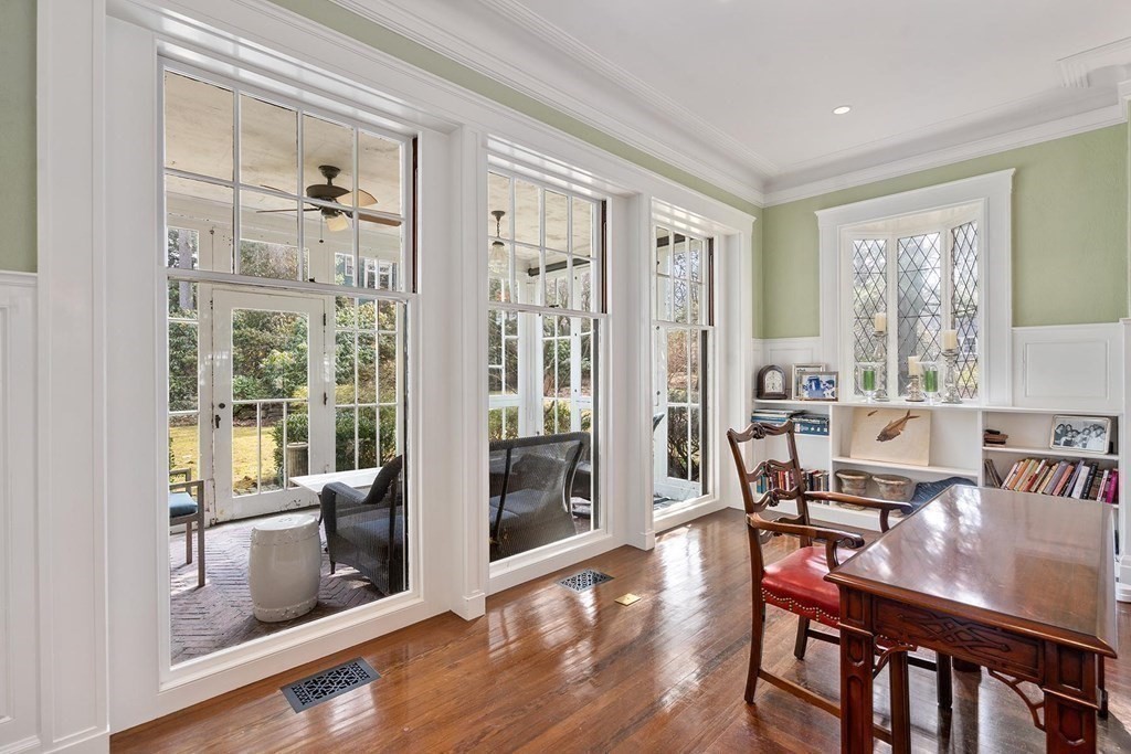 37 Circuit Road Brookline, MA 02467 - Photo 10 of 37 a view of a dining room with furniture large windows and wooden floor