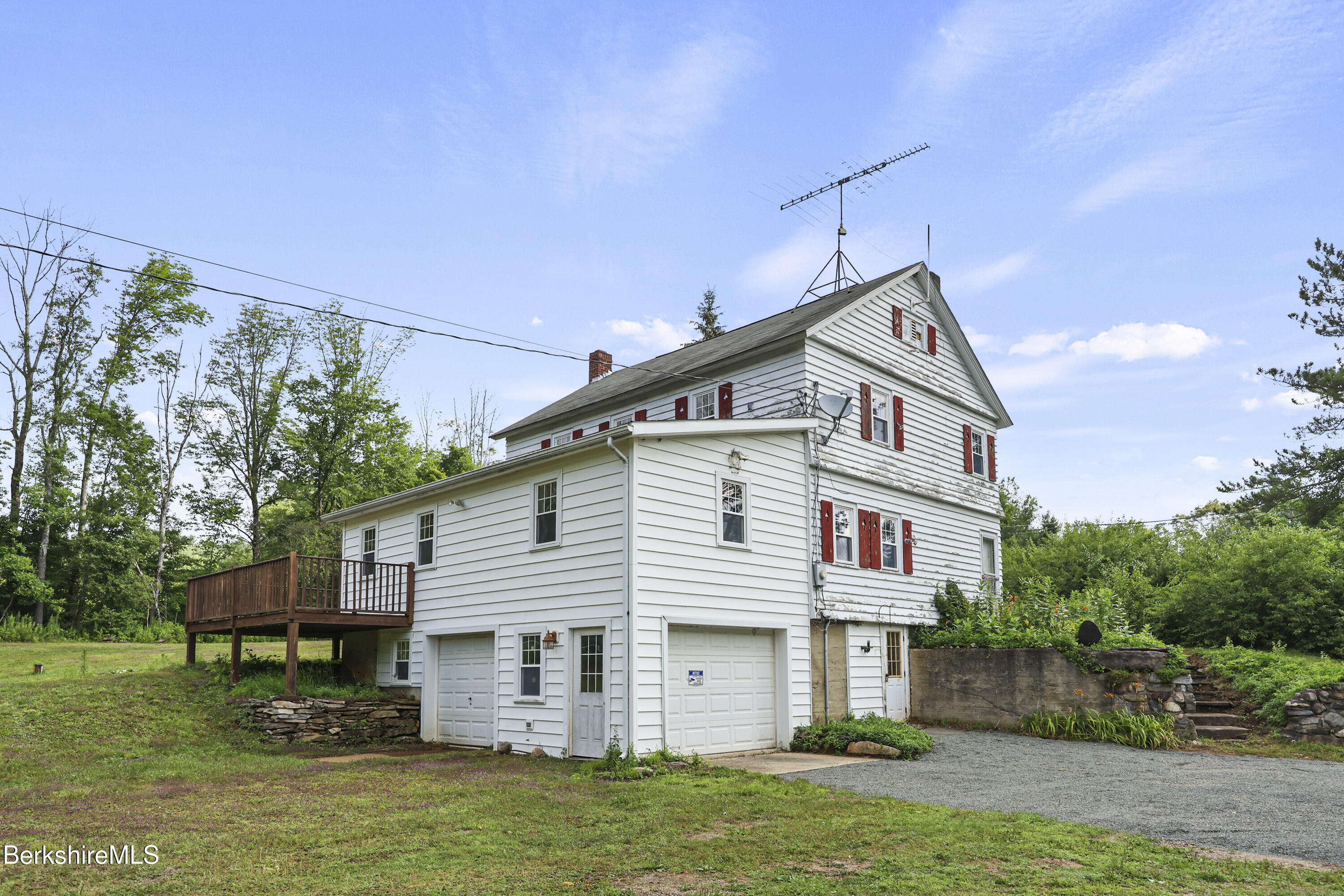132 South Washington State Road Washington, MA 01223 - Photo 34 of 41 a front view of a house with a yard
