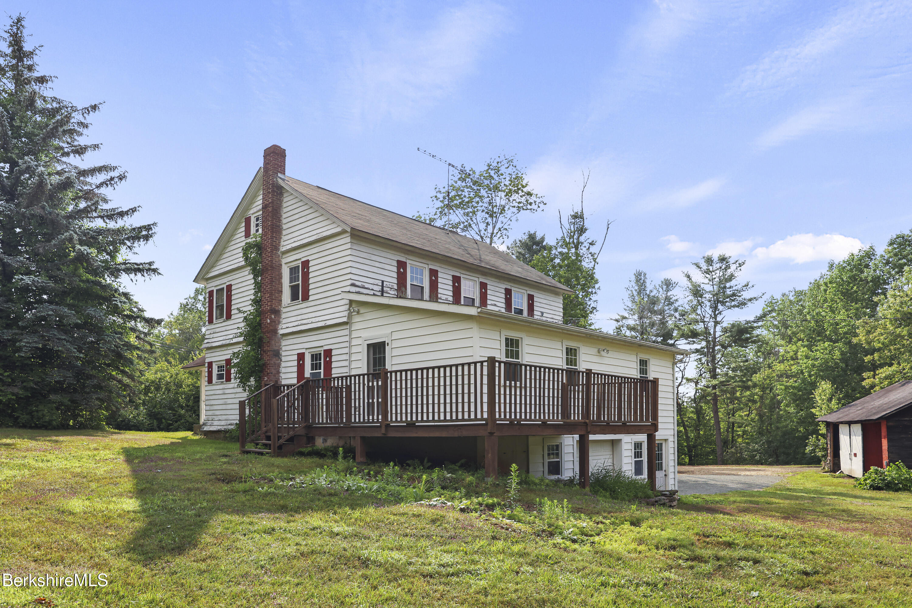 132 South Washington State Road Washington, MA 01223 - Photo 36 of 41 a view of a house with a yard and deck