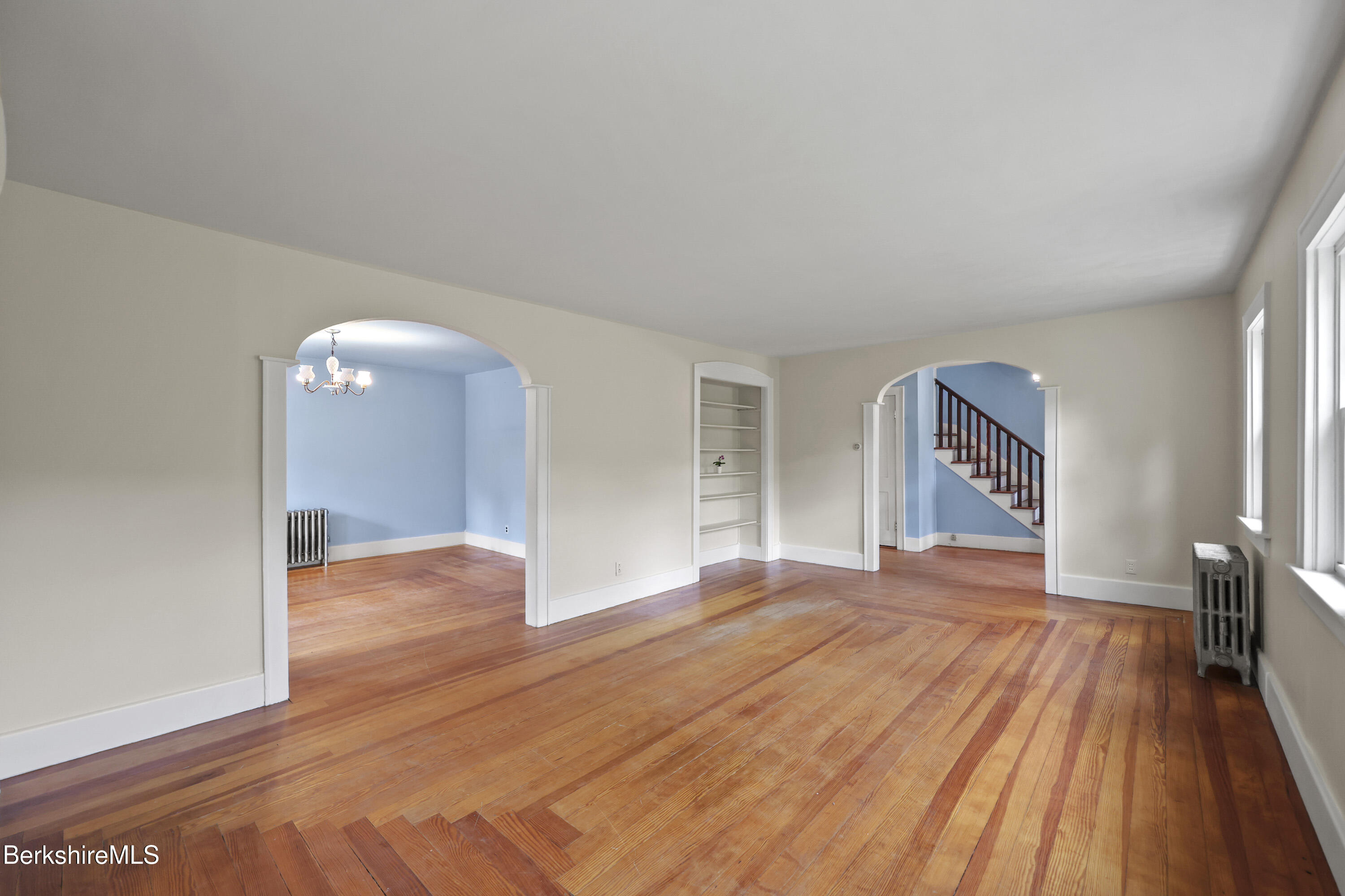 132 South Washington State Road Washington, MA 01223 - Photo 4 of 41 a big room with wooden floor and bedroom view