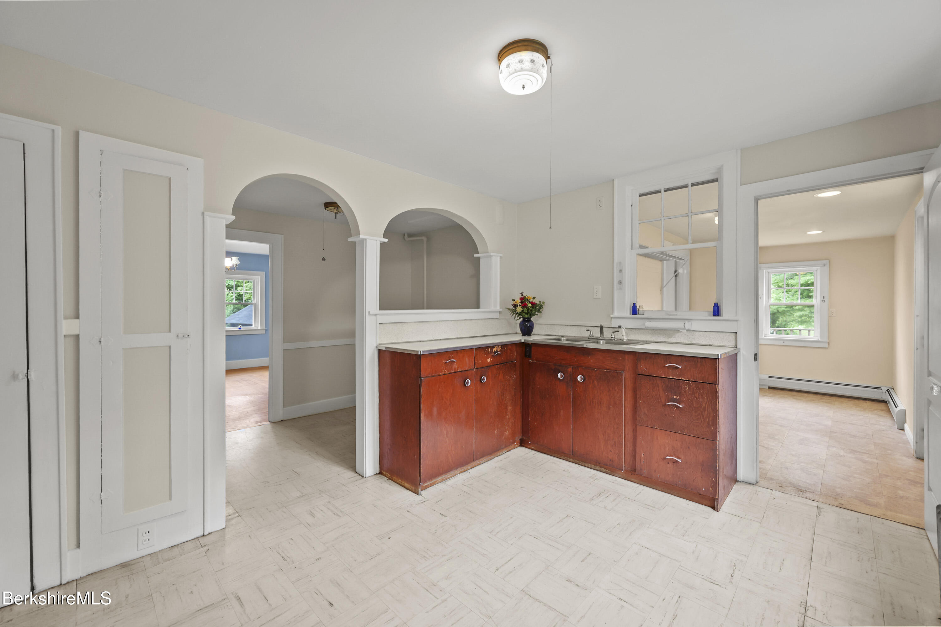 132 South Washington State Road Washington, MA 01223 - Photo 8 of 41 wooden floor with a sink and a large mirror