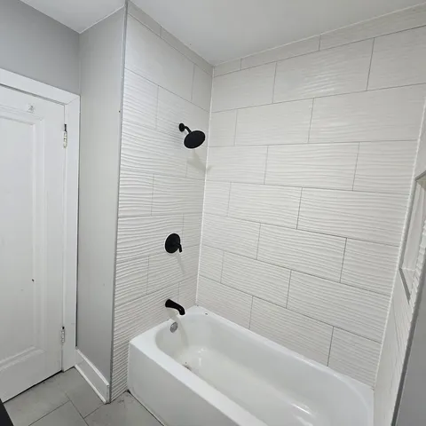 a bathroom with a bathtub