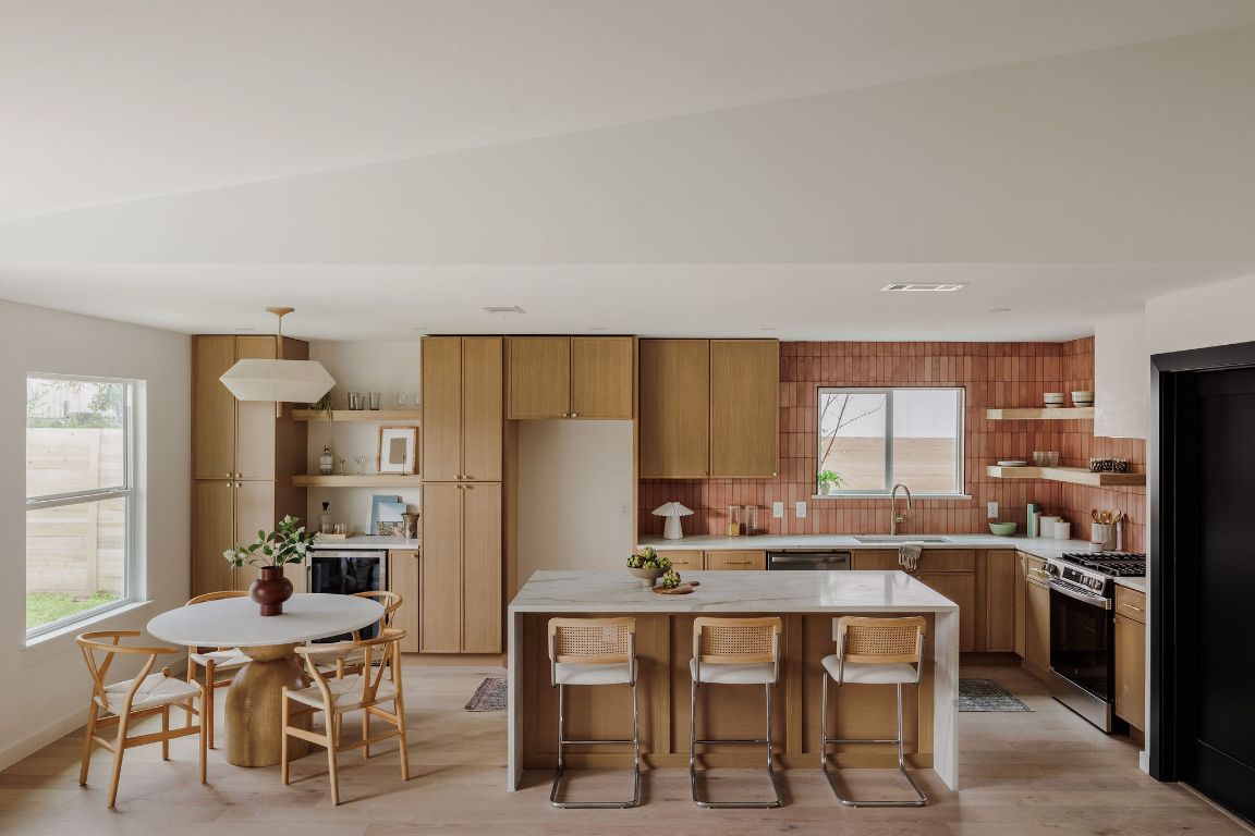2009 Lear Lane Austin, TX 78745 - Photo 1 of 38 Stunning kitchen design showcases soft-close natural oak cabinetry.