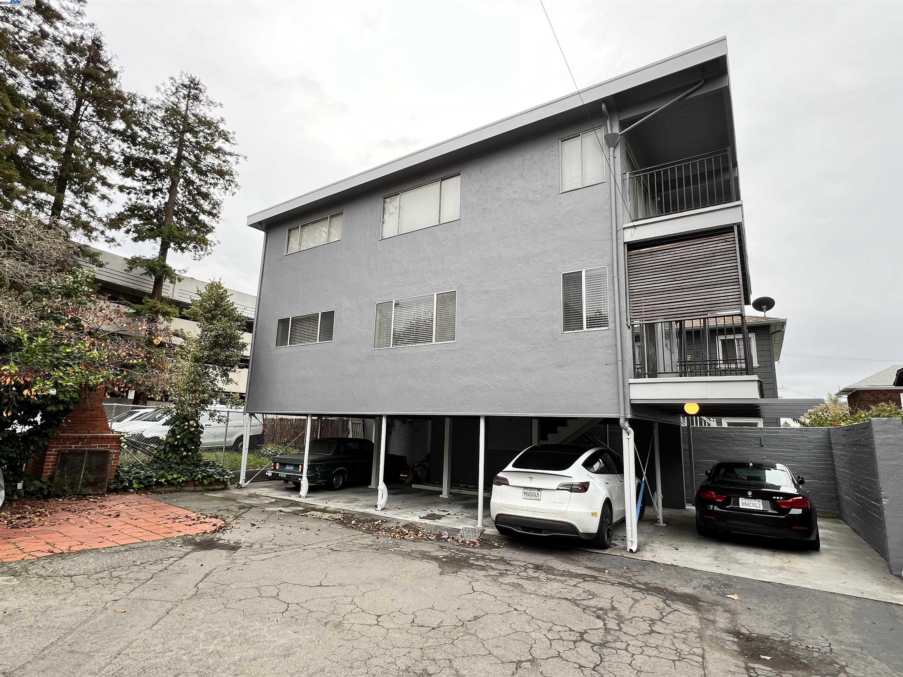 2418 Ashby Avenue, Unit B Berkeley, CA 94705 - Photo 7 of 17 a car parked in front of a house