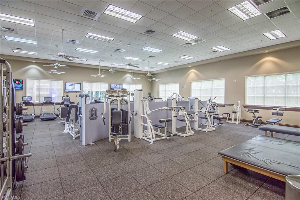 963 Egrets Run, Unit 102 Naples, FL 34108 - Photo 35 of 39 a view of a room with gym equipment