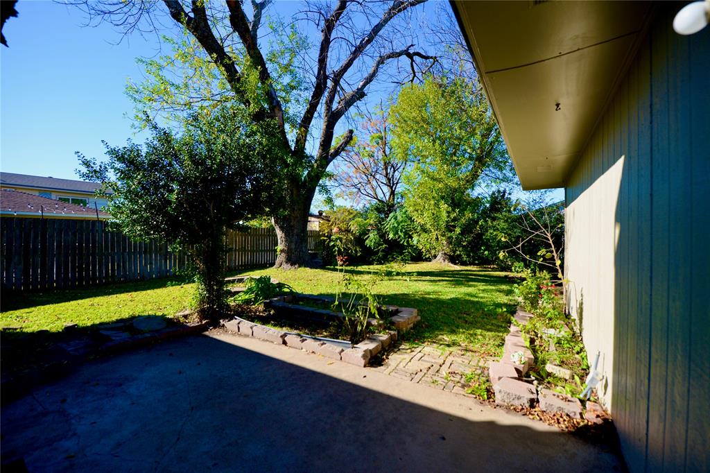 2021 Mill Pond Road Garland, TX 75044 - Photo 17 of 20 a garden view with a seating space