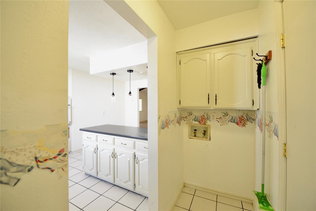 2021 Mill Pond Road Garland, TX 75044 - Photo 9 of 20 a bathroom with a shower