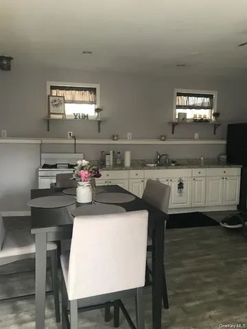 a view of a kitchen with a sink