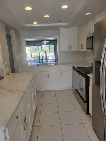 $579,000 | 318 Windrush Boulevard, Unit 9, Indian Rocks Beach, FL 33785