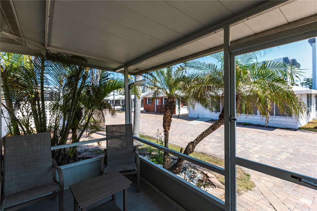6020 Midnight Pass Road, Unit 10 Sarasota, FL 34242 - Photo 3 of 21 a view of outdoor space with seating