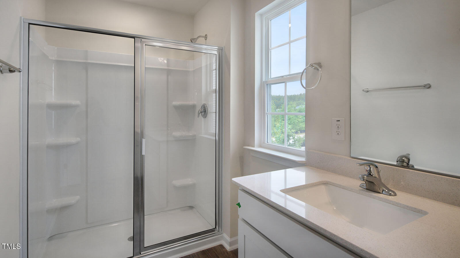 613 Stream Walk Crossing Wendell, NC 27591 - Photo 19 of 32 a bathroom with a granite countertop sink mirror and shower