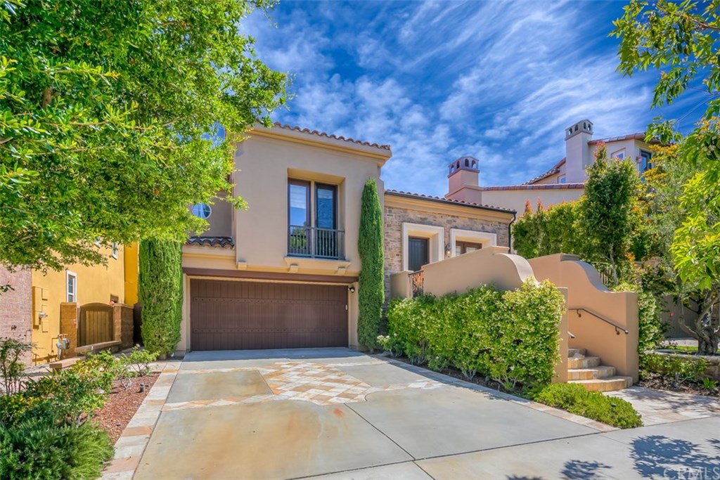 31 Climbing Vine Irvine, CA 92603 - Photo 1 of 20 a front view of a house with plants