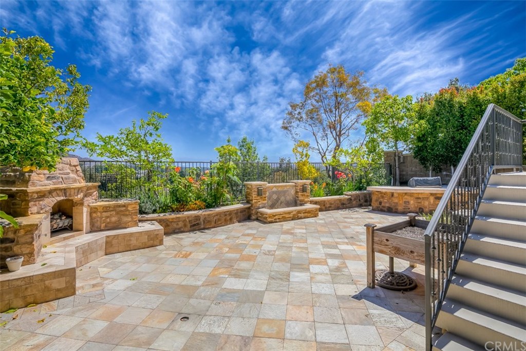 31 Climbing Vine Irvine, CA 92603 - Photo 17 of 20 a view of a terrace with chairs and potted plants