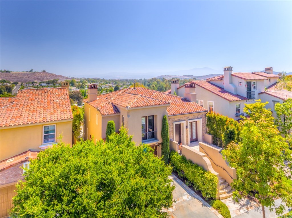 31 Climbing Vine Irvine, CA 92603 - Photo 2 of 20 aerial view of a house with a yard and balcony