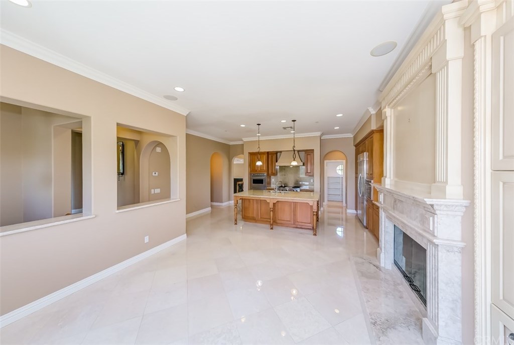 31 Climbing Vine Irvine, CA 92603 - Photo 7 of 20 a view of open kitchen with furniture and large window