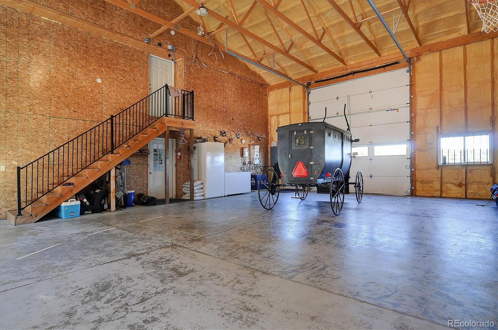 1700 Mitchell Mountain Road Westcliffe, CO 81252 - Photo 17 of 40 a view of a livingroom with furniture and an entryway
